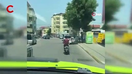 Sultanbeyli’ şoke eden görüntü: Motosiklet sürerken kucağında bebek taşıdı