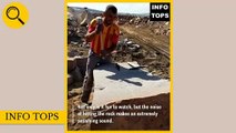 This guy is the master of splitting rocks - all he needs is a hammer and a few nails