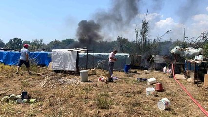 Fethiye'de otluk alanda çıkan yangın kümeslere sıçramadan söndürüldü