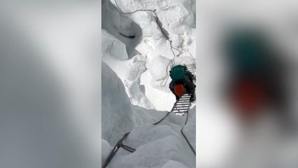 Nayla climbing the ladder