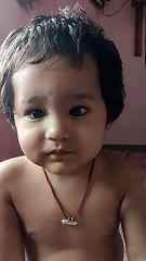 Cute Baby Is playing with camera