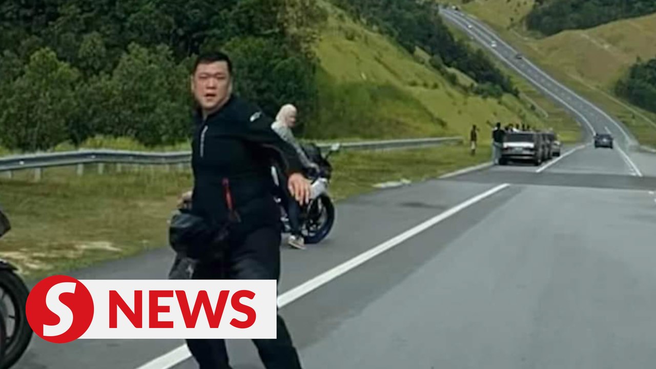 Cops searching for aggressive biker caught on dashcam