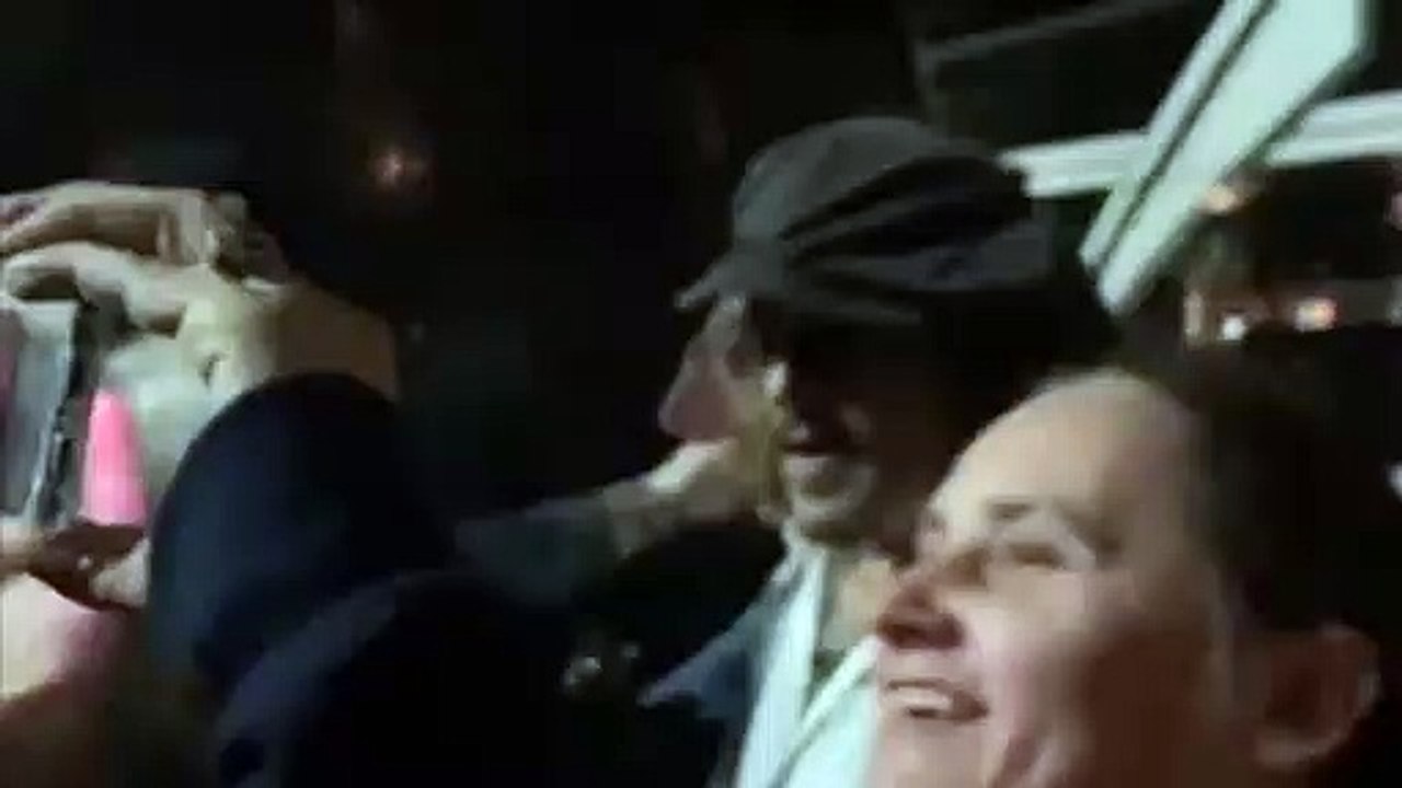 Fans meet Johnny Depp outside Sheffield City Hall last night after his special guest appearance with Jeff Beck
