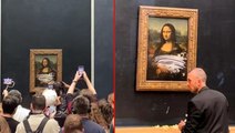 Yaşlı kadın kılığına giren iklim aktivisti, Mona Lisa tablosuna pasta fırlattı