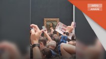 Potret Mona Lisa | Potret Mona Lisa dibaling kek