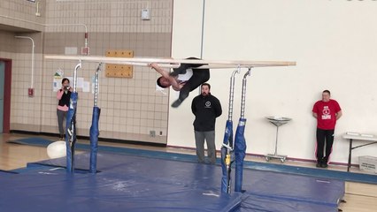 'Gymnast suffers embarrassing fail while performing cool maneuvers on parallel bars'