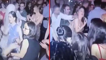 Düğünde dans ettiği kadına para takmak isterken karısından baskın yiyen adam viral oldu