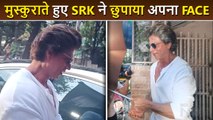 Khan Sahab' Shouts Media As ShahRukh Hides His Face With An Umbrella, Slightly Gives A Smile