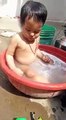 Baby enjoying bath this indian summer, cute moments