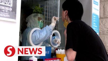 In Shanghai, lockdown blues make way for Covid testing gripes