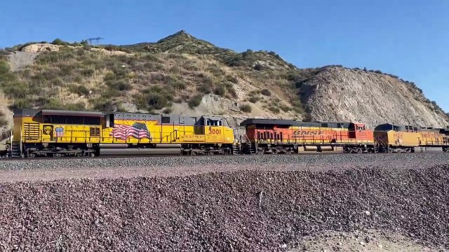 UP 6865 Leads Eastbound Manifest Meets BNSF 7355 Leads Westbound Spine Train at Blue Cut CA