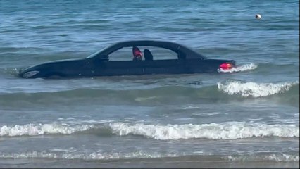 "You can't park there" - moment BMW is washed away on Cornish beach