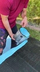 He uses a yard rake to refurbish the table!