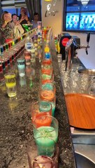 Rows of Colorful Drinks Expertly Mixed