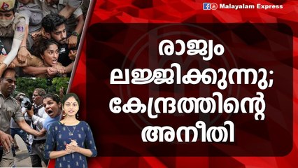 സമരം ചെയ്‌ത ഗുസ്തി താരങ്ങളെ തെരുവിൽ വലിച്ചിഴച്ച് ഡൽഹി പോലീസ്
