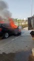 लग्जरी कार में लगी आग, पुलिसकर्मी ने चालक को बचाया
