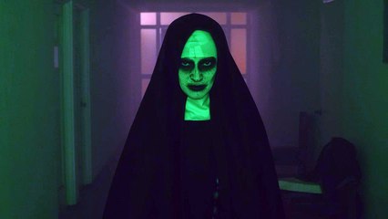 mixkit-creepy-ghost-nun-walking-looking-at-the-camera-41759-medium