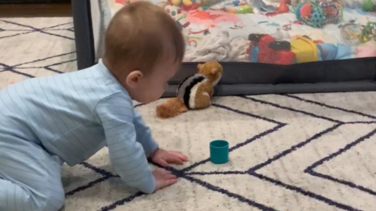 Mischievous girl turns baby brother into a wrecking ball to knock down toy tower