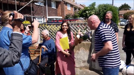 The whole community comes out to wish the owner of a Shoreham post office and shop well on retirement after 34 years in the family business