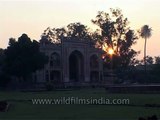 Taj Mahal mausoleum complex covered in mist