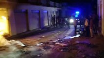 Iron shutter torn in cosmetic warehouse exploded, one youth standing o