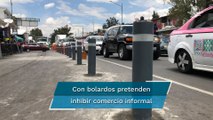 Para evitar regreso de ambulantes, instalan bolardos en Eje 1, tras operativo