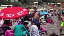 Gök gürültülü sağanak beklenen Antalya’da, güneşi gören sahile koştu