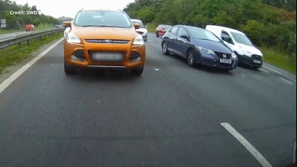 Dash cam footage captures the moment a motorbike crashed into a car