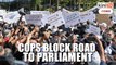 Police block road to Parliament, deputy minister accepts memorandum