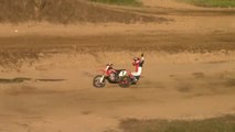 Rider Falls Off Dirt Bike After Fail Landing Jump During Race