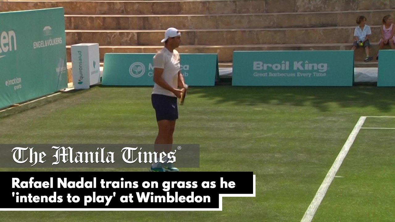 Rafael Nadal trains on grass as he 'intends to play' at Wimbledon