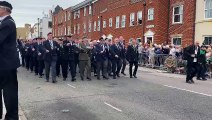 Veterans being given a rousing reception as they marched through Broad Street, Old Portsmouth