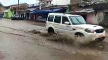 Video story- Feet full of water filling 100 meters long road on Anuppu