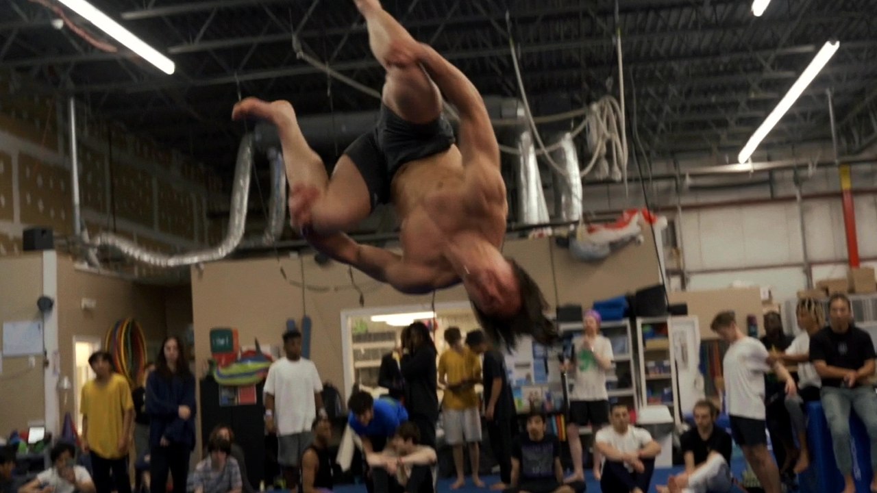 'Tricking athlete effortlessly performs a FLIPPIN'LY INSANE combo '
