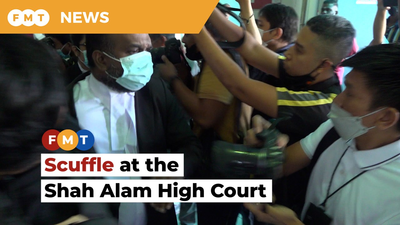 Samirah's lawyer gets into a scuffle with photographers