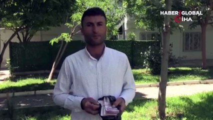 Binlerce lira para dolu poşeti sahibine teslim etti