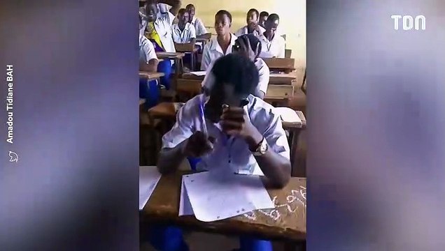 Un préfet coupe les cheveux des élèves pendant le baccalauréat