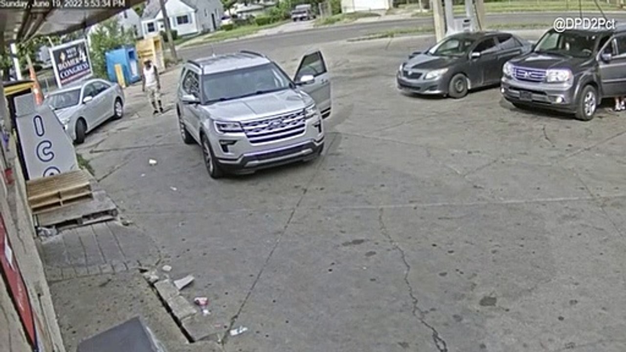 man pulls gun on dad holding his baby at gas station