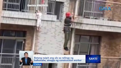 Batang naipit ang ulo sa railings ng balkonahe, sinagip ng construction worker | Saksi