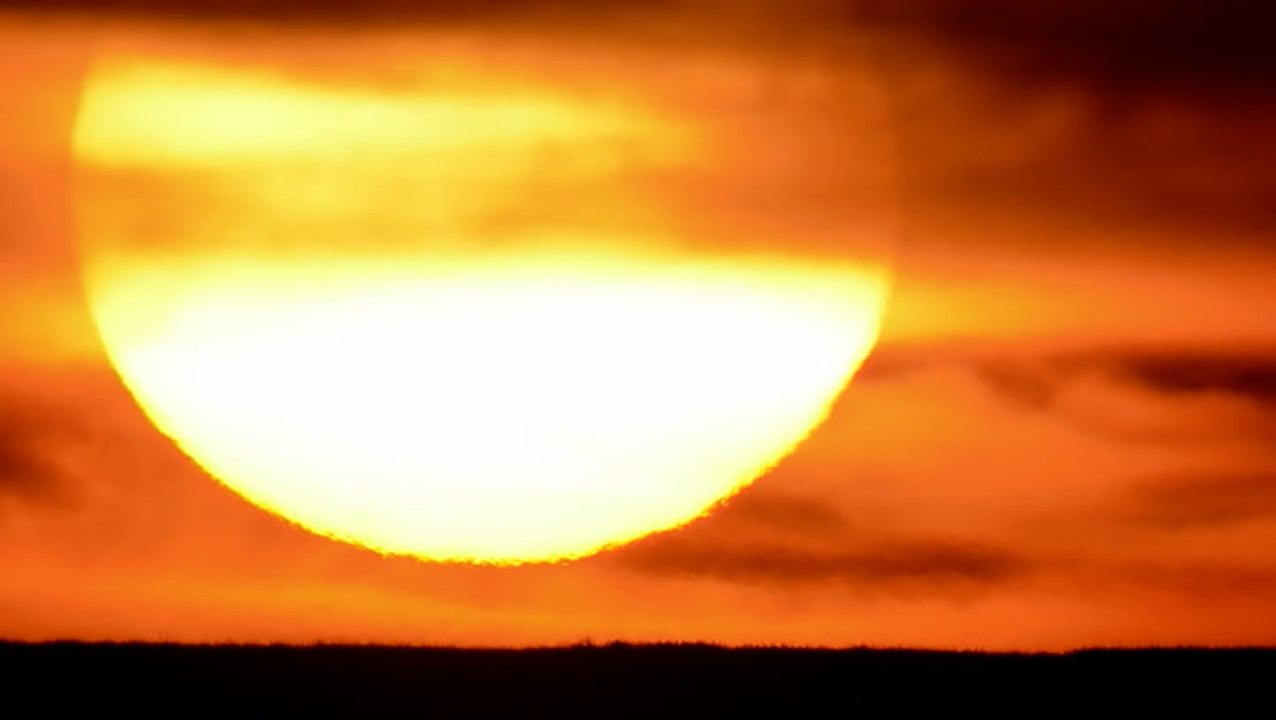 Warming stripes getting darker as temperatures rise