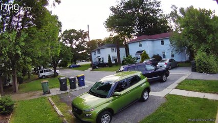 Woman Loses Control of Car and It Backs Into Neighbor's Vehicle