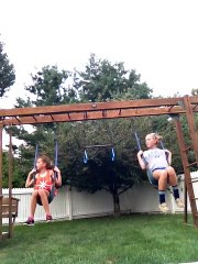 Kid Falls Out of Her Swing