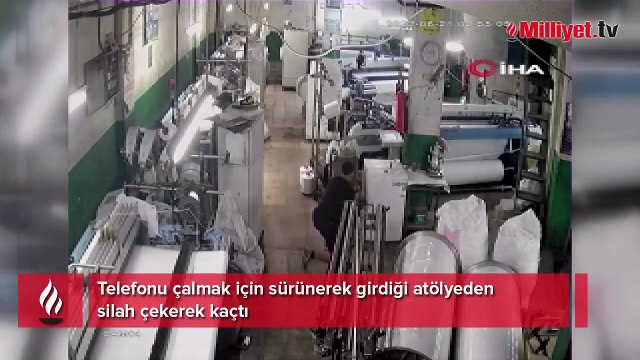 Telefonu çalmak için sürünerek girdiği atölyeden silah çekerek kaçtı