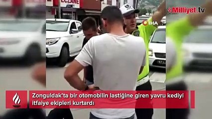 Lastiğe sıkışan kediyi ekipler kurtardı