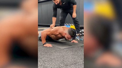A mechanic has smashed the world record for most push-ups in an hour - completing a staggering 3,183