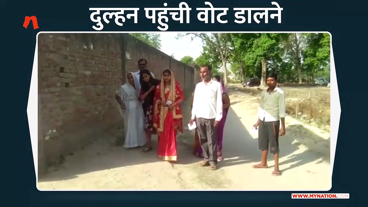 शादी के जोड़े में मतदान