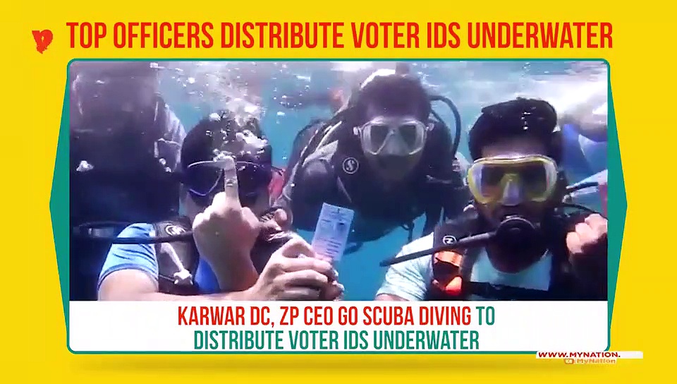 Karwar deputy commissioner distributes voter IDs underwater