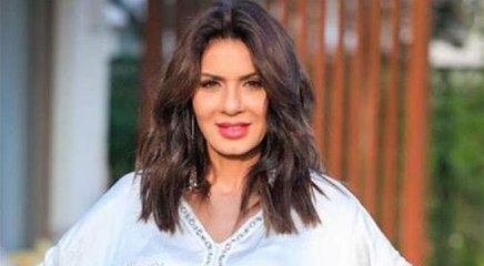 نجلاء بدر ترتدي من جديد فستان "الجونة" المثير للجدل باللون الأحمر