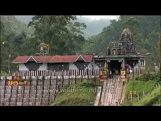 Murugan temple with Munnar tea gardens behind