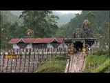 Murugan temple with Munnar tea gardens behind